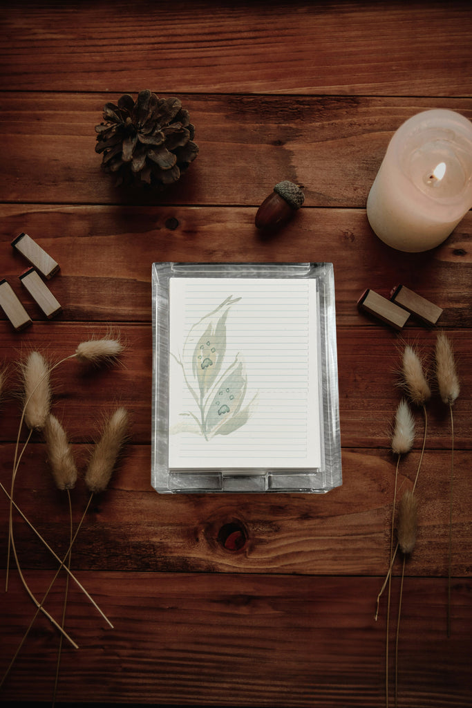 Custom acrylic notepad with a leaf printed with paw prints