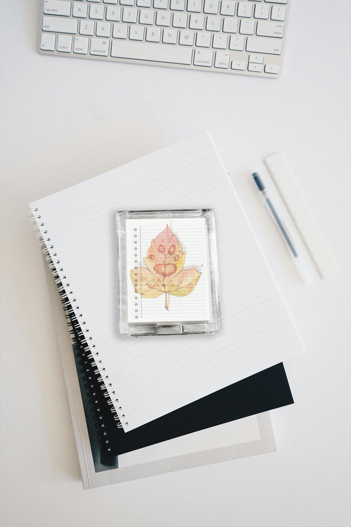 Paw with Leave watercolor design, pen, and keyboard on a light surface