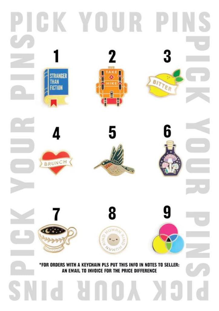 Mini Tote Enamel Pin Chart - Features a Book enamel pin, a hiking themed pin, a lemon pin, a brunch themed enamel pin, a hummingbird pin, a mushroom pin, a coffee lover pin, a kind human pin, and a colorful pin