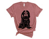 Linocut Cavalier King Charles Spaniel in black and white printed with a direct to garment printer on a mauve Bella + Canvas soft t-shirt.