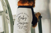 Coming Soon! Baby Name Glitter Graphic Dog Shirt in Black and White - Modeled by Chance the Golden Retriever