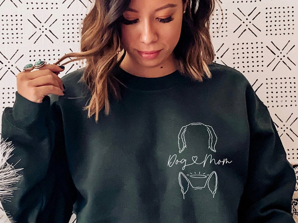 Personalized Pocket Dog, Cat, or Other Pet's Ears Outline Tattoo Inspired Crew Neck Bella + Canvas Unisex Black Sweatshirt  - Personalized with Two Dog Ear Graphics and "Dog Mom" Printed in Heart Cursive